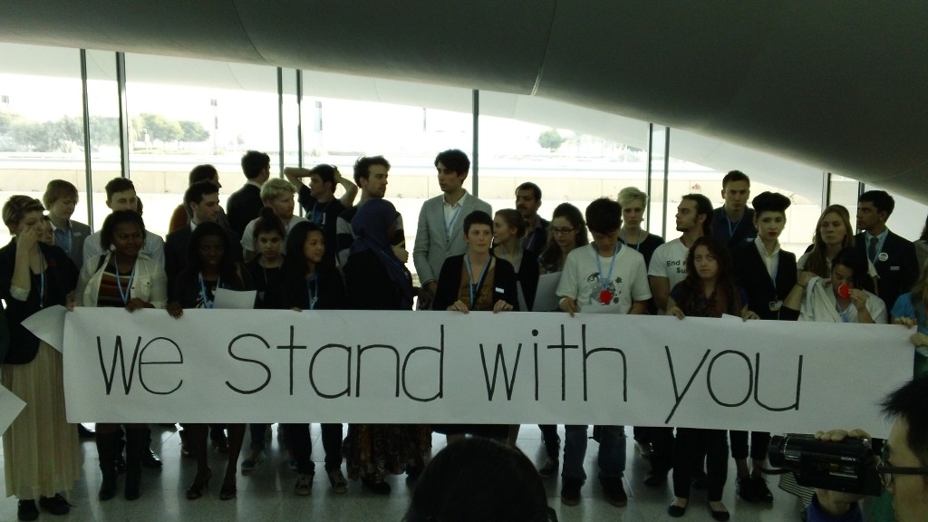 Youth voicing support for developing countries who were taking a strong stance against developed countries during UN climate talks in Doha