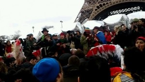 Sit in action on the Pont d'Iéna.